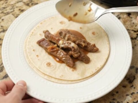 Slow cooker skirt steak with pineapple and chipotle in creamy Monterey Jack sauce
