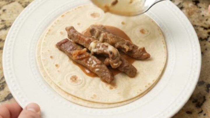 Slow cooker skirt steak with pineapple and chipotle in creamy Monterey Jack sauce