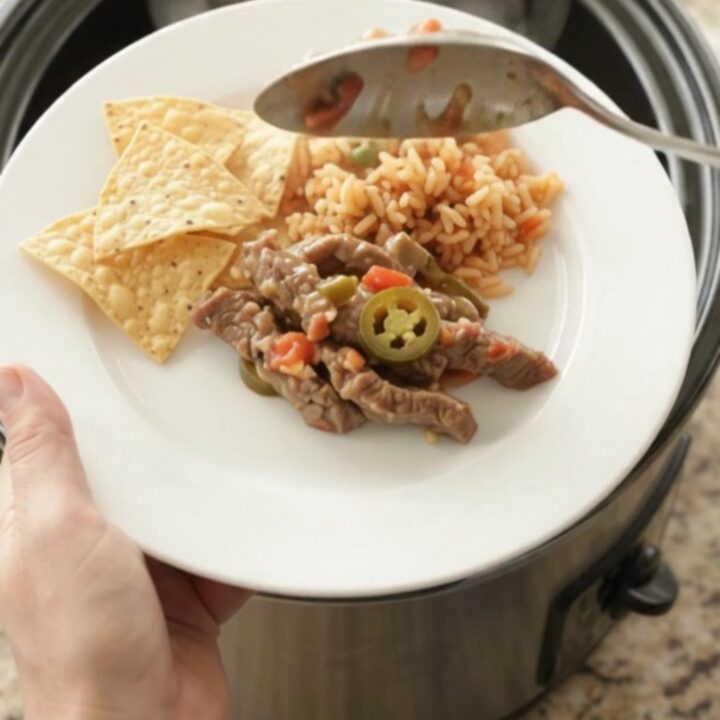 Slow-cooker skirt steak in creamy pepper jack sauce with tomatoes and jalapeños.
