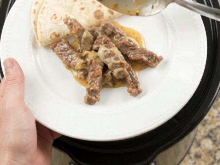 Slow-cooker skirt steak in creamy tomato-jalapeño sauce with melted cheese