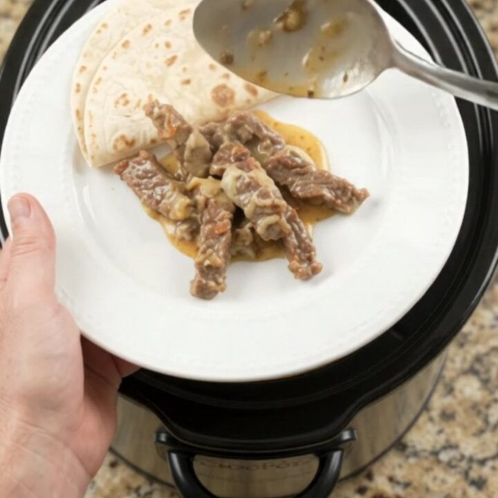 Slow-cooker skirt steak in creamy tomato-jalapeño sauce with melted cheese