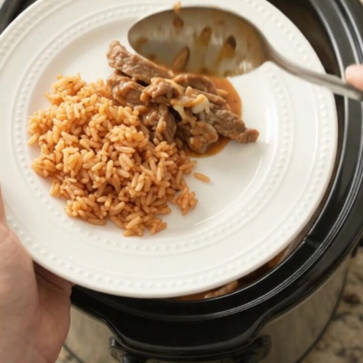 Tender skirt steak strips in a cheesy taco bean sauce in a slow cooker