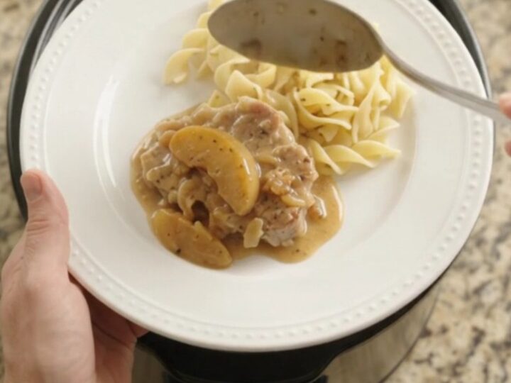 Slow cooker pork chops with apples in creamy cider sauce