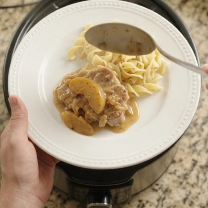 Slow cooker pork chops with apples in creamy cider sauce