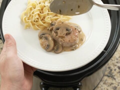 Slow cooker pork medallions in creamy mushroom-ranch gravy, served over egg noodles