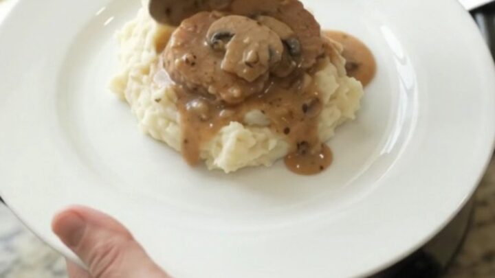 Pork tenderloin medallions in creamy mushroom-ranch sauce in a slow cooker.
