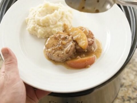 Pork medallions and apples in a creamy butter sauce in a slow cooker