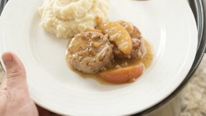 Pork medallions and apples in a creamy butter sauce in a slow cooker