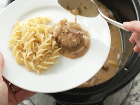 Slow cooker pork medallions in creamy honey-Dijon sauce with shallots, served in the crockpot