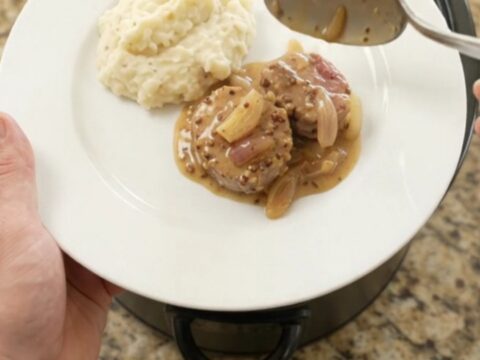 Pork medallions in a creamy honey-Dijon sauce in a slow cooker