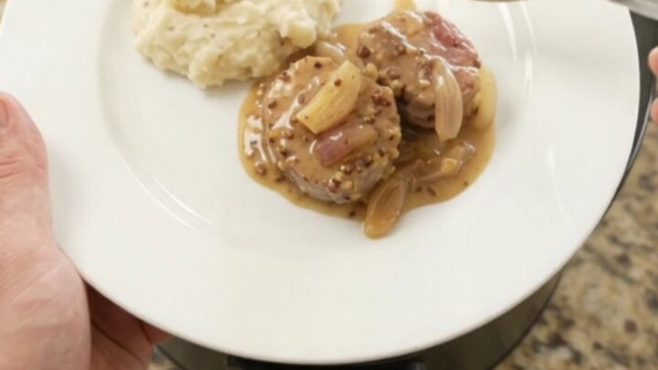 Pork medallions in a creamy honey-Dijon sauce in a slow cooker