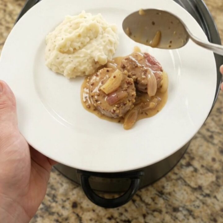Pork medallions in a creamy honey-Dijon sauce in a slow cooker