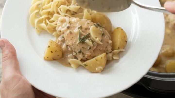 Crockpot full of creamy turkey and potatoes with gravy