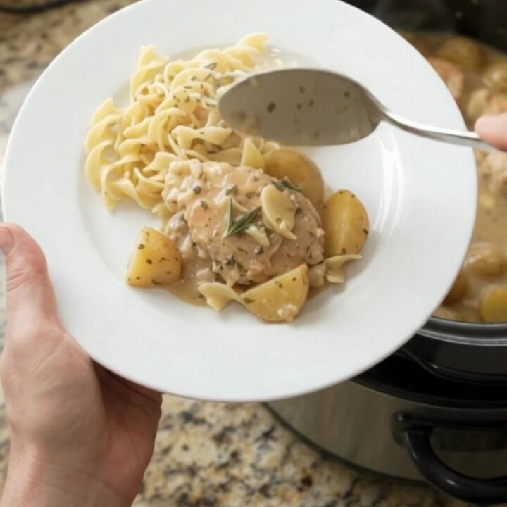 Crockpot full of creamy turkey and potatoes with gravy