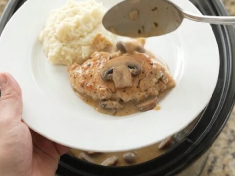 Crockpot chicken cutlets in creamy mushroom ranch sauce with butter and herbs