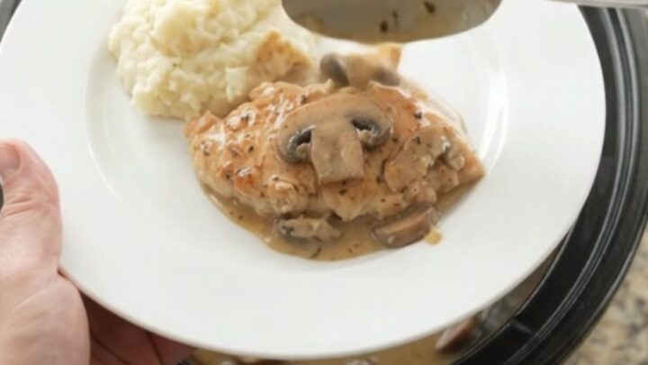 Crockpot chicken cutlets in creamy mushroom ranch sauce with butter and herbs