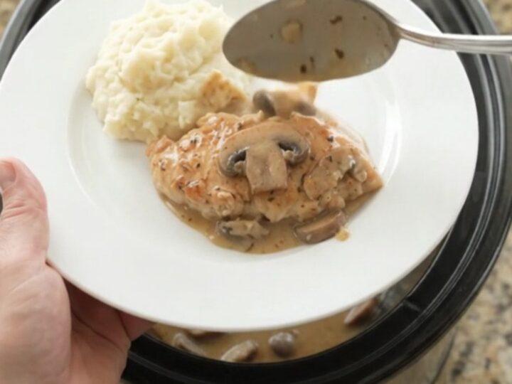 Crockpot chicken cutlets in creamy mushroom ranch sauce with butter and herbs