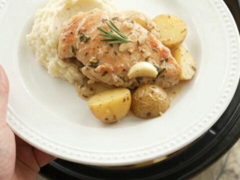 Slow cooker chicken cutlets with baby potatoes in creamy garlic herb sauce