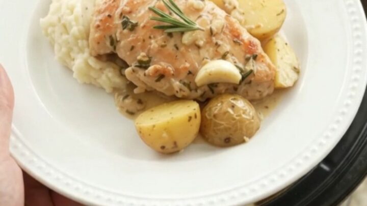 Slow cooker chicken cutlets with baby potatoes in creamy garlic herb sauce