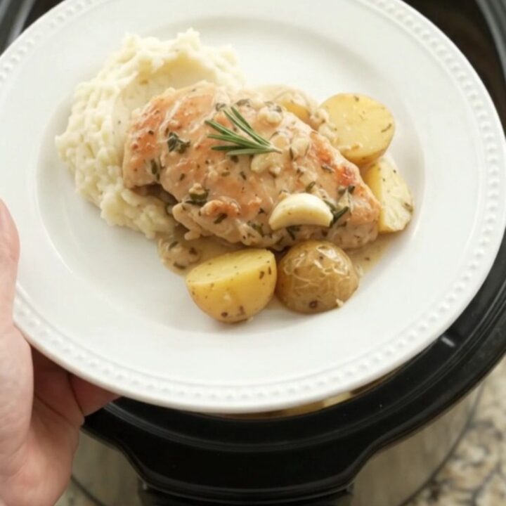 Slow cooker chicken cutlets with baby potatoes in creamy garlic herb sauce