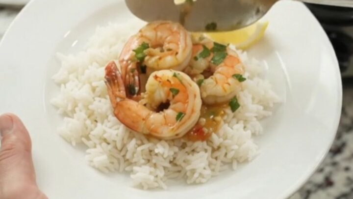 Slow cooker shrimp boil with jumbo shrimp, corn, and potatoes in chili-lime butter sauce