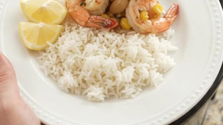 Crockpot chili lime butter shrimp with corn and garlic in a glossy sauce