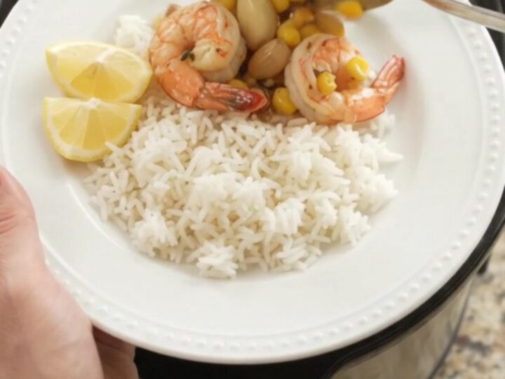Crockpot chili lime butter shrimp with corn and garlic in a glossy sauce