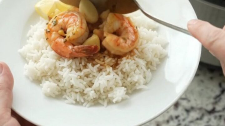 Slow cooker shrimp with corn and garlic in Cajun butter sauce