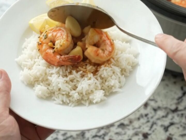 Slow cooker shrimp with corn and garlic in Cajun butter sauce