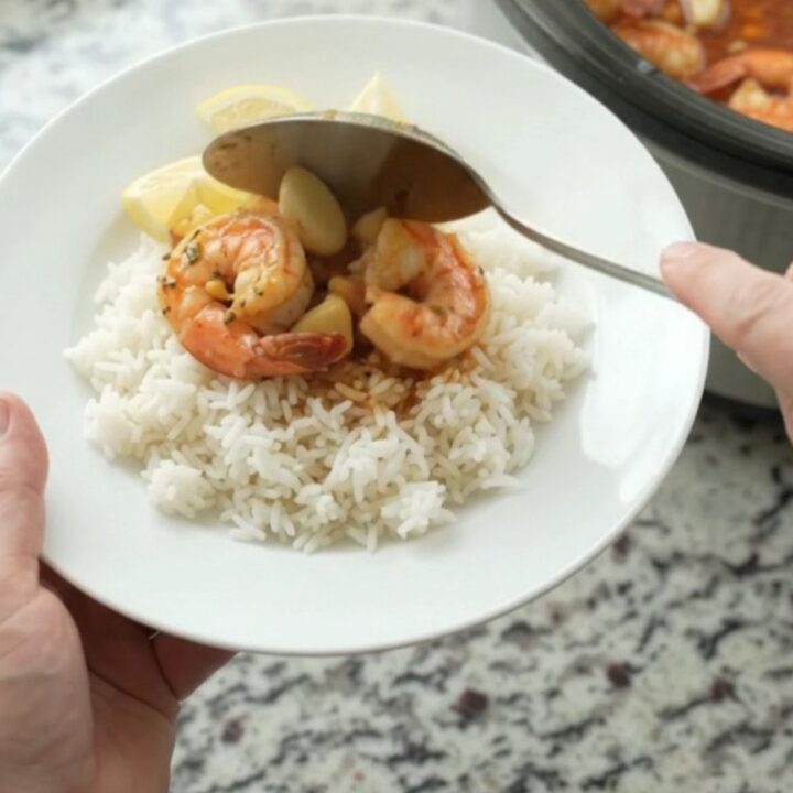 Slow cooker shrimp with corn and garlic in Cajun butter sauce