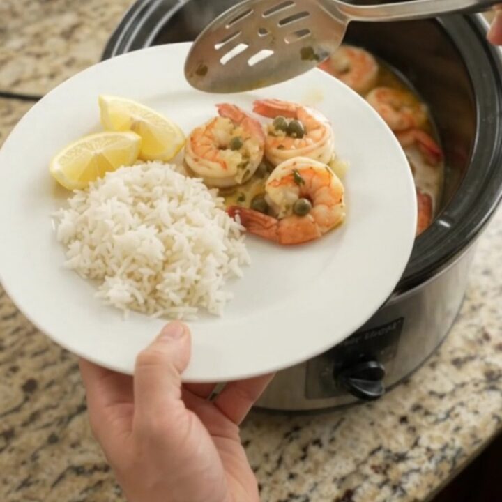 Slow-cooker chili lime butter shrimp with lemon and capers in a glossy sauce