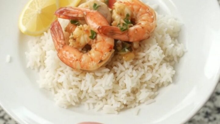 Slow cooker seafood boil with snow crab, shrimp, corn, and potatoes in chili-lime butter sauce