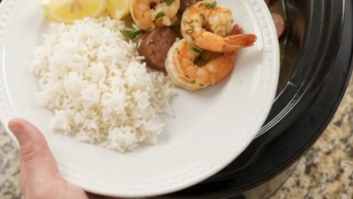 Slow cooker chili lime butter lobster boil with shrimp, sausage, and potatoes