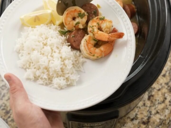 Slow cooker chili lime butter lobster boil with shrimp, sausage, and potatoes