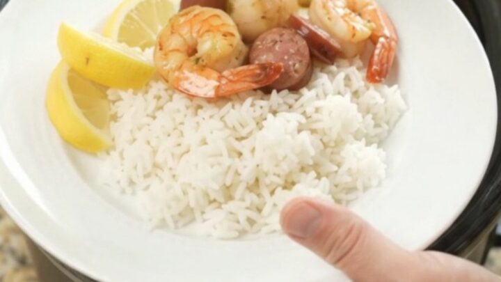 Slow cooker seafood boil with scallops, shrimp, Andouille, and potatoes in a chili-lime butter sauce