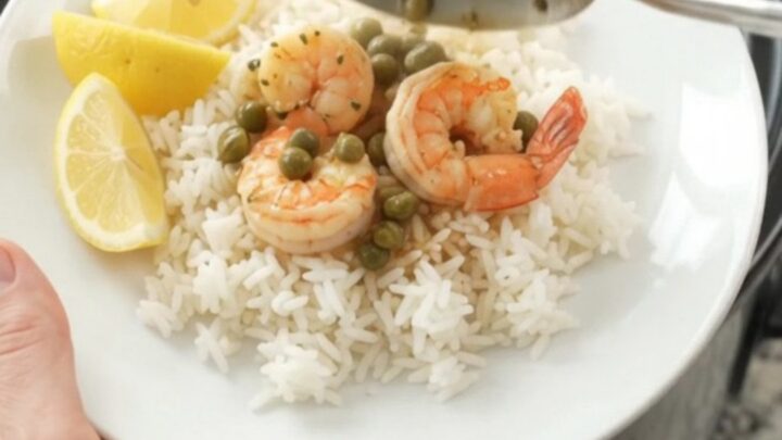 Golden slow-cooked sea scallops and shrimp in a lemon-caper butter sauce in a slow cooker