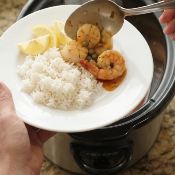 Slow cooker bayou butter lemon capers sea scallops with shrimp in a rich red sauce