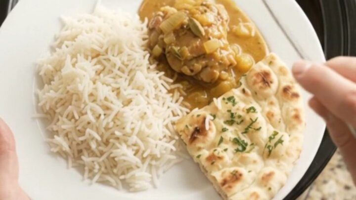 Slow cooker garlic butter korma chicken thighs in golden sauce