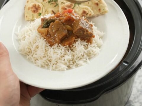 Slow cooker red curry beef brisket with coconut cream, bamboo shoots, and red bell pepper