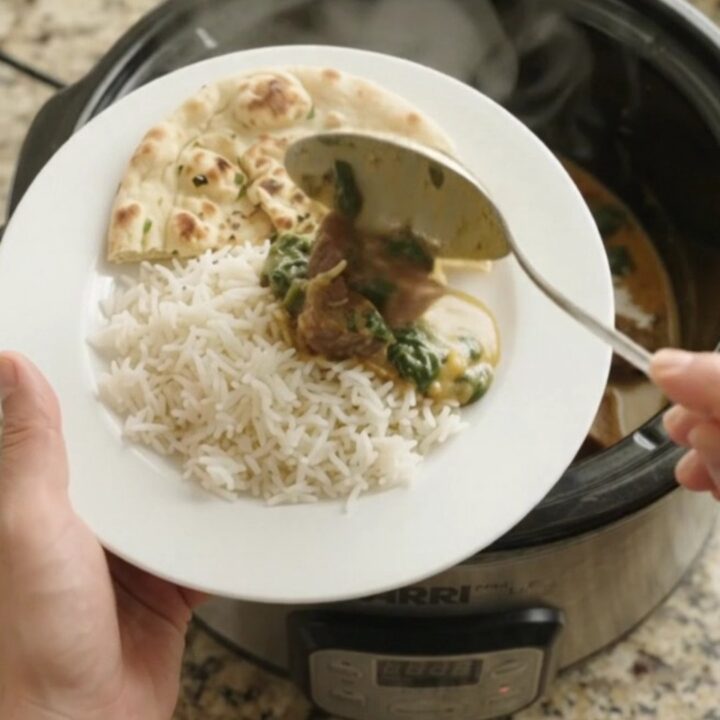 Creamy coconut spinach saag with tender beef brisket in a slow cooker