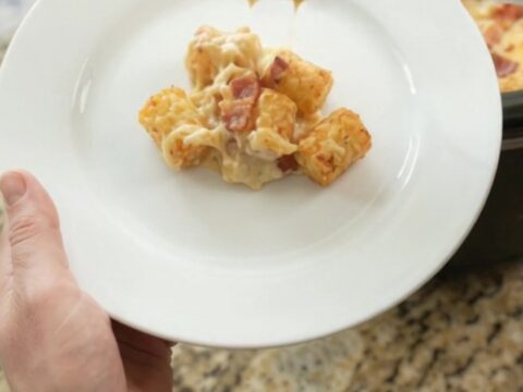 Slow cooker tater tot bake with melted cheese and bacon