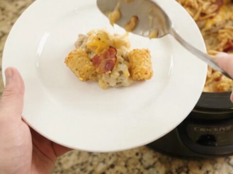 Slow cooker tater tot bake with melted pepper jack cheese and crispy onions