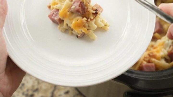 Bubbling slow cooker hashbrown bake with melted pepper jack and crispy onions