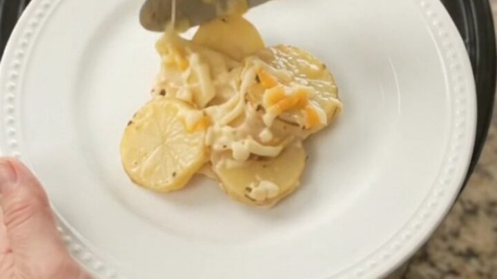 Bubbling Crockpot Colby-Jack Ranch Scalloped Potatoes with melted cheese and creamy sauce