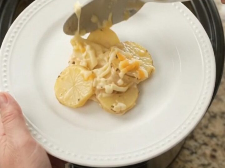 Bubbling Crockpot Colby-Jack Ranch Scalloped Potatoes with melted cheese and creamy sauce
