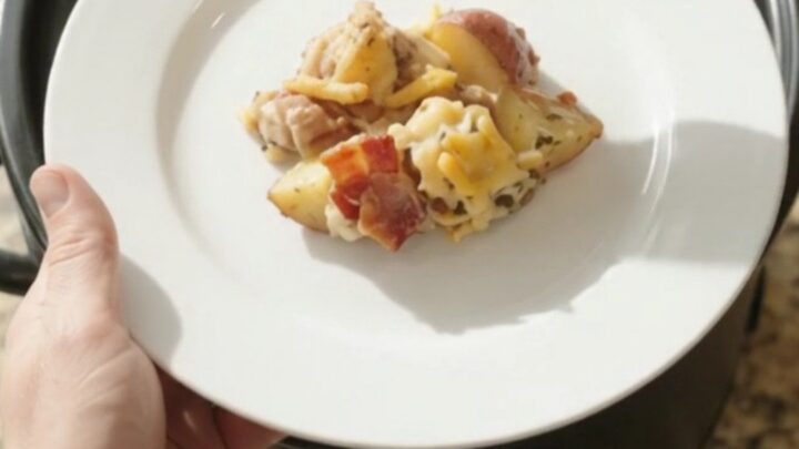 Bubbling Crockpot pepper jack ranch potato bake with melted cheese and crispy onions