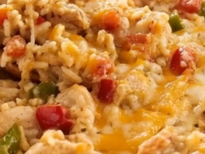 An extreme close-up of a wooden spoon lifting a steaming, ultra-stretchy scoop of melted cheese, chicken