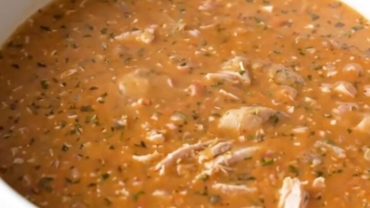 A steaming bowl of creamy buffalo turkey chowder with chunks of tender potatoes and ground turkey.