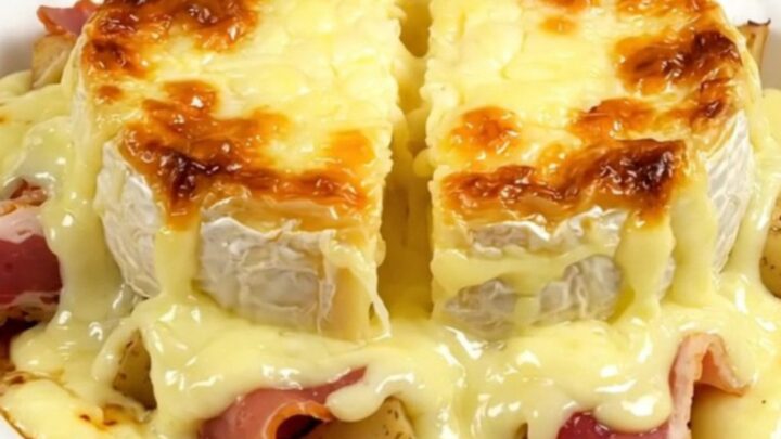 A rustic slow cooker Pela des Aravis with melted Reblochon cheese on top.
