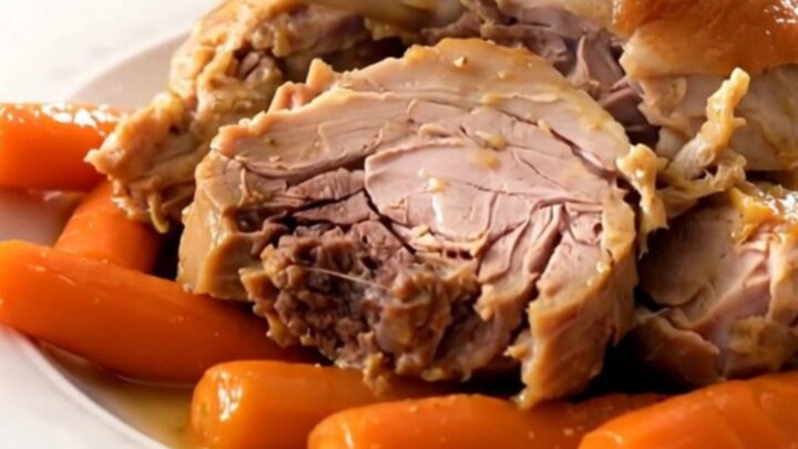 Two tender turkey drumsticks braised with carrots and onions in a white wine sauce.